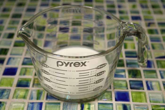 Low carb ranch dressing being whisked together in a bowl
