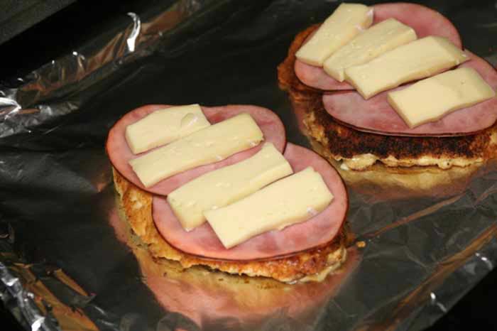 Top each breast with ham and brie.