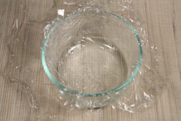 Line a 1-quart dish with cellophane, using enough so it hangs well over the sides.