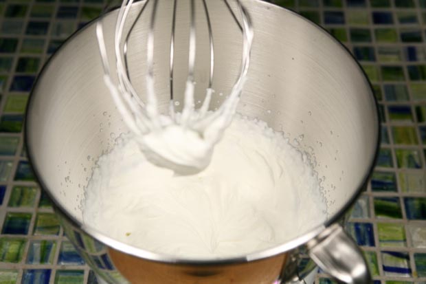 In another bowl, whip the heavy cream to soft peaks.