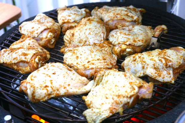 Set the chicken in a smoker or barbecue and cook low and slow at 275°F.